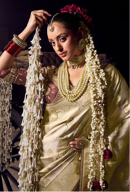 Beige viscose tissue hanworked pallu saree with embroidered blouse piece