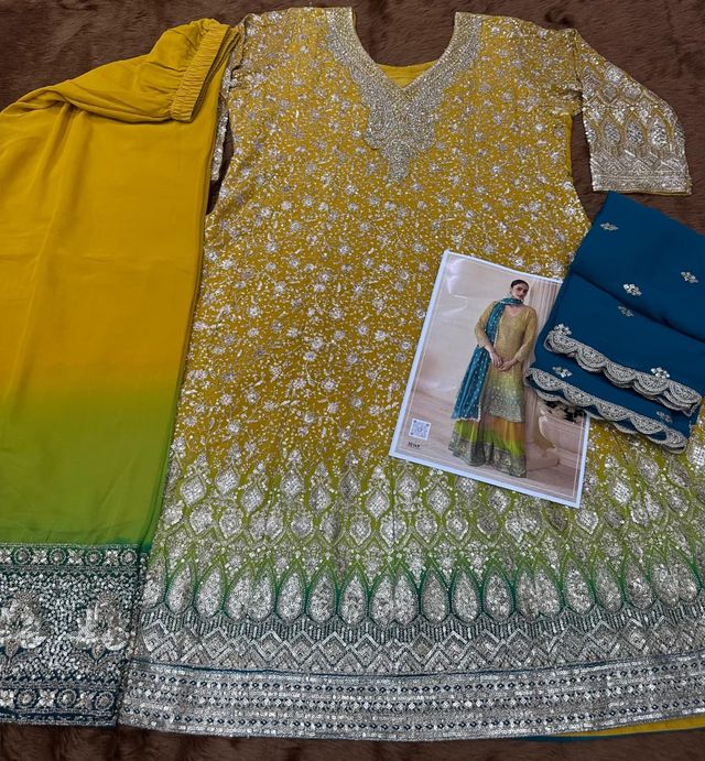 Yellow pure geogette full stitched suit Free Size upto 42