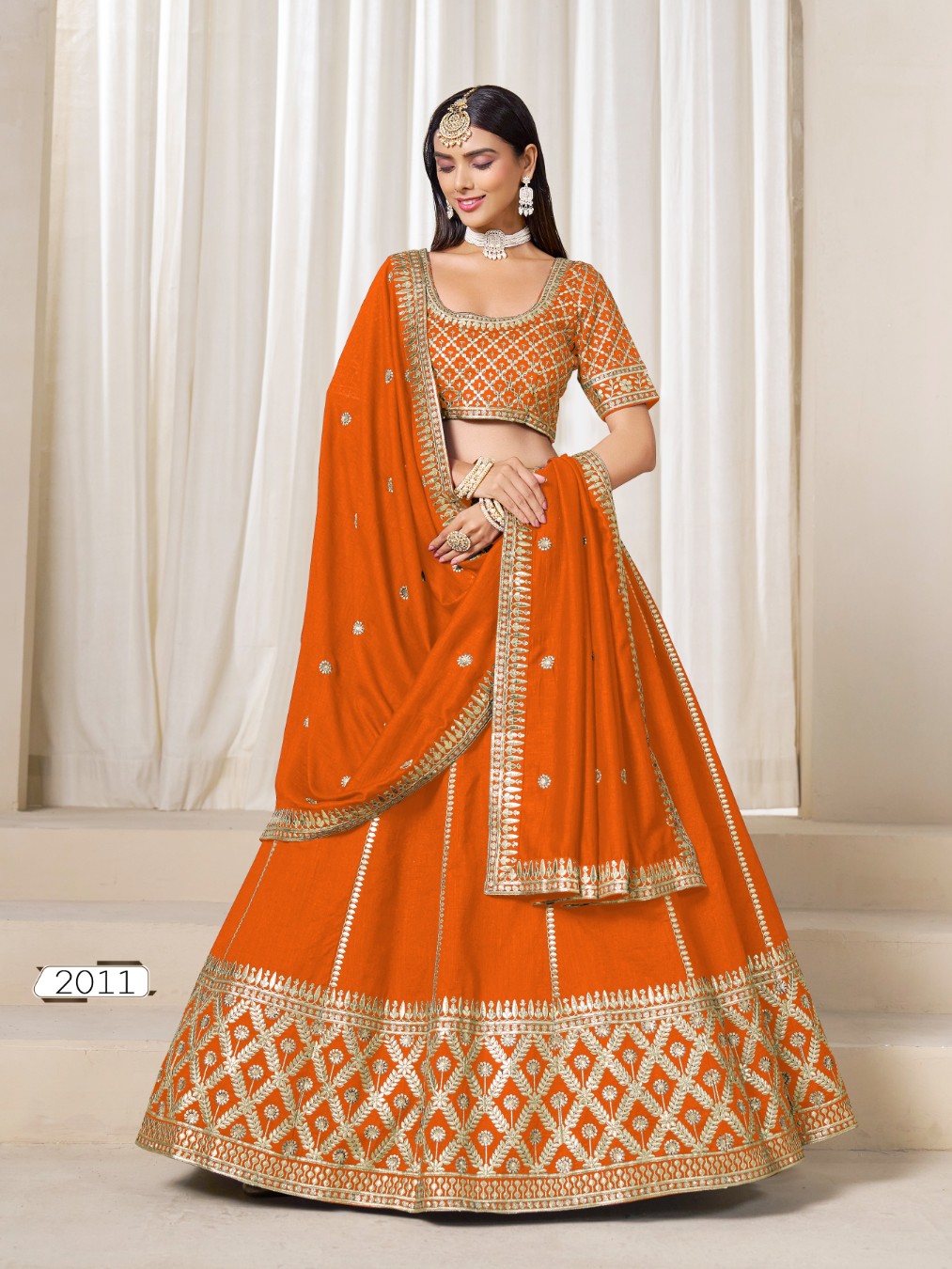 Orange embriodered art silk designer semi stitched Lehenga choli