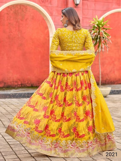 Yellow art silk semi stitched lehenga choli with taby silk print