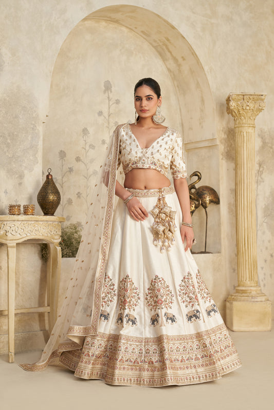 White Lehenga with Intricate Elephant Zari Work