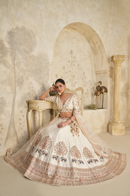 White Lehenga with Intricate Elephant Zari Work