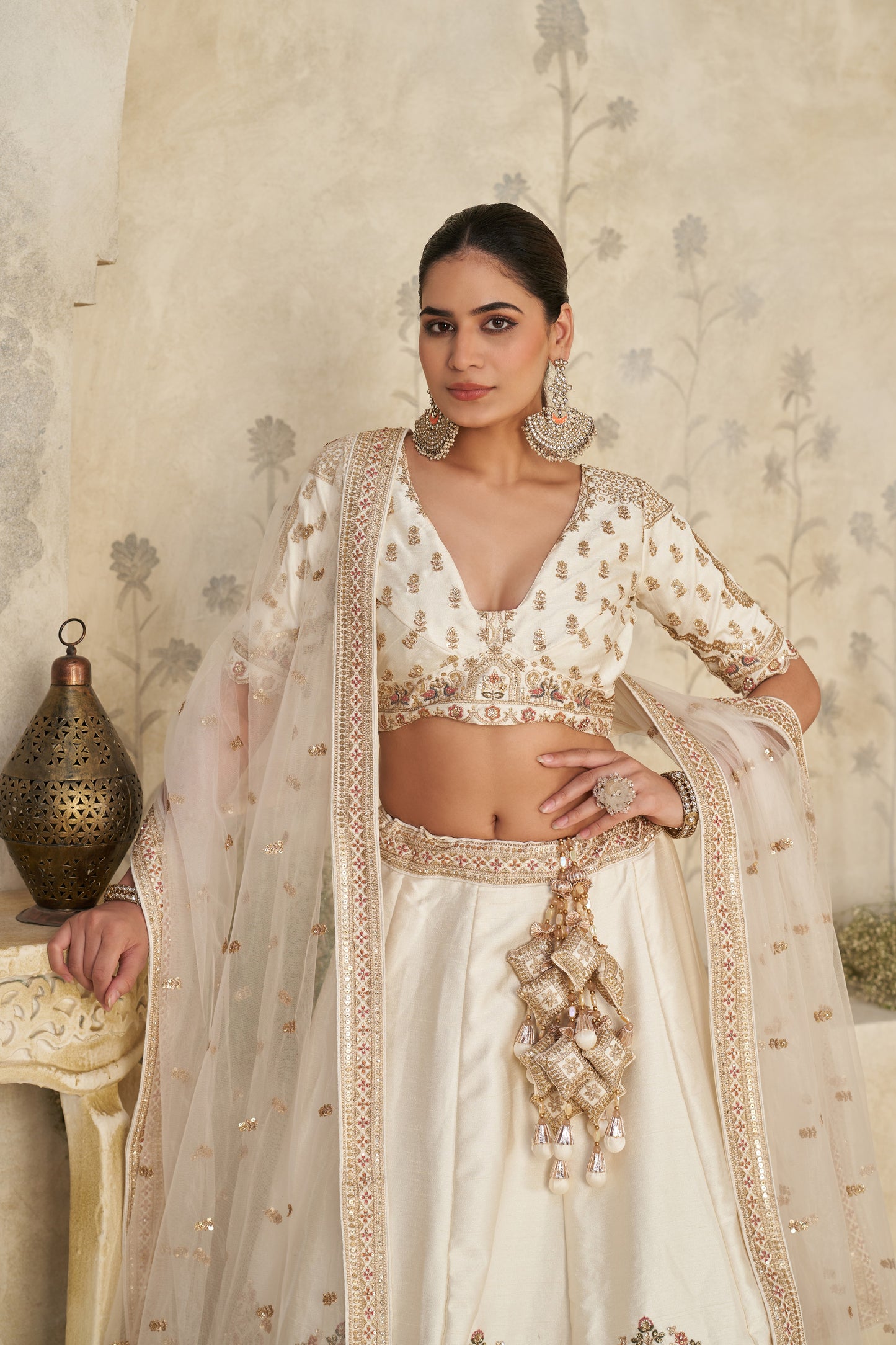White Lehenga with Intricate Elephant Zari Work