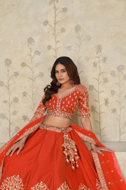 Trendy Rust Wedding Lehenga with Elephant Motifs