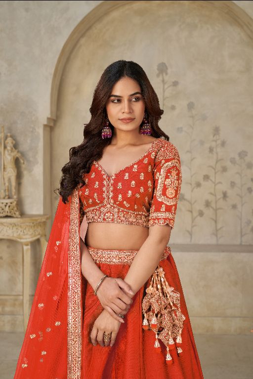 Trendy Rust Wedding Lehenga with Elephant Motifs