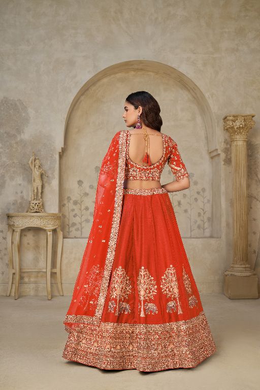 Trendy Rust Wedding Lehenga with Elephant Motifs