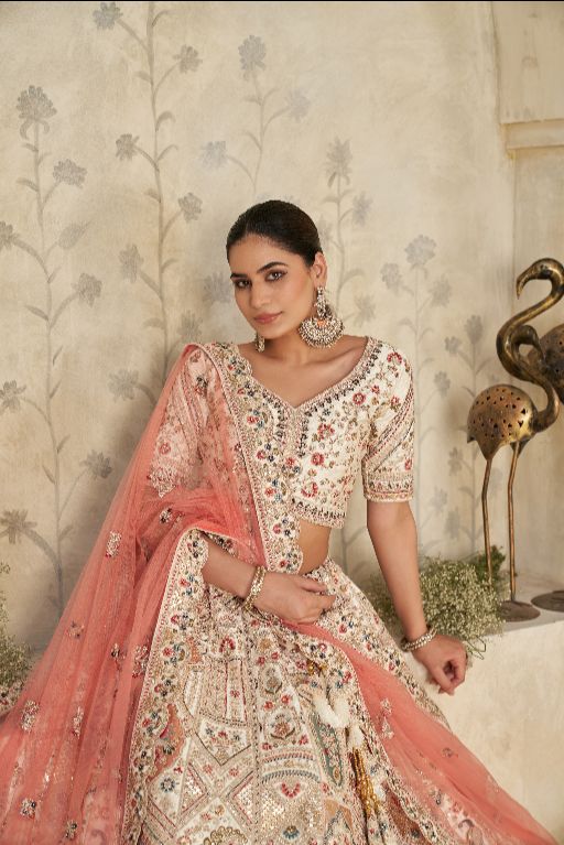 Intricately Embroidered Cream Zari Lehenga with Royal Motifs