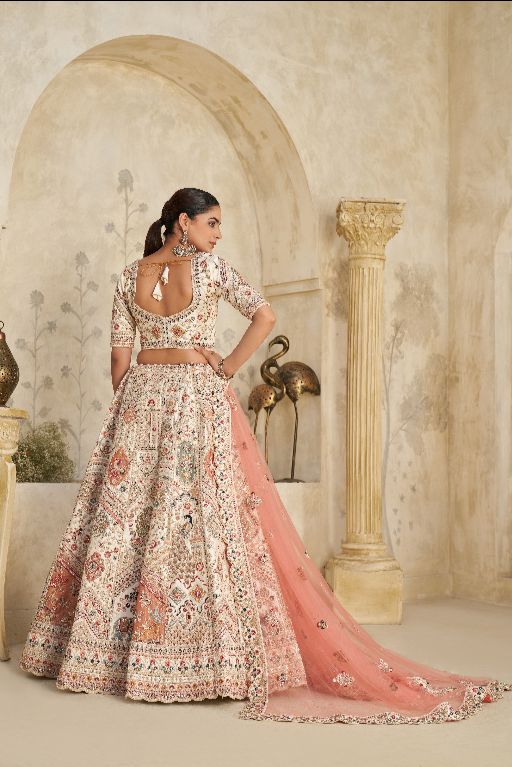 Intricately Embroidered Cream Zari Lehenga with Royal Motifs