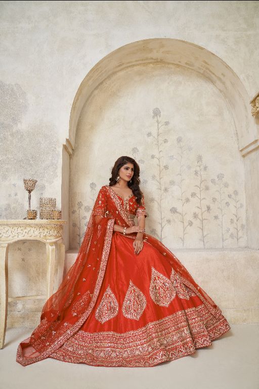 Trendy Rust Wedding Lehenga with Leaf Embroidery