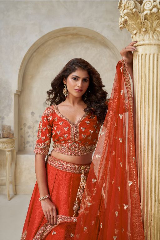 Trendy Rust Wedding Lehenga with Leaf Embroidery