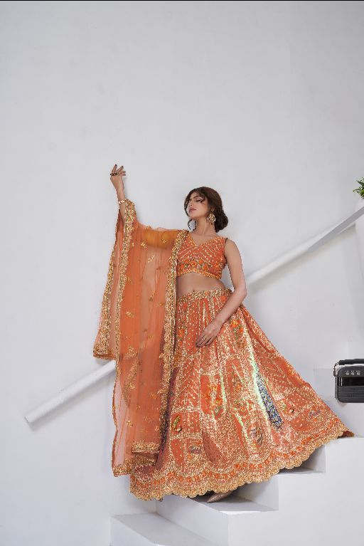 Designer Rust Raw Silk Lehenga with Peacock Feather Work