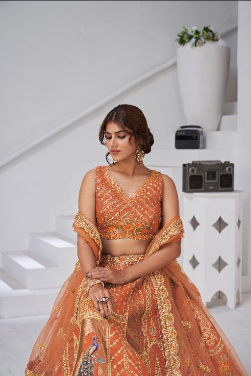 Designer Rust Raw Silk Lehenga with Peacock Feather Work