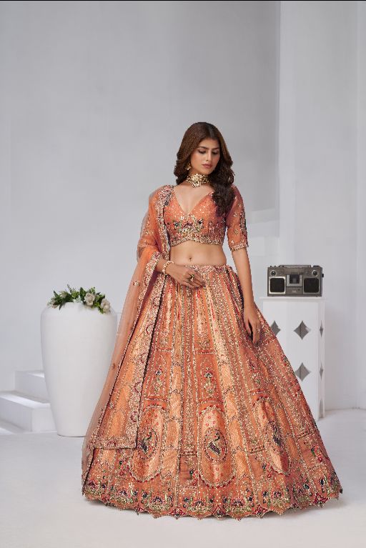 Grace in Rust – Elegant Lehenga with Golden Detailing