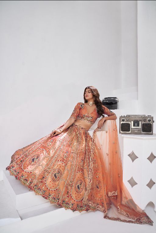 Grace in Rust – Elegant Lehenga with Golden Detailing