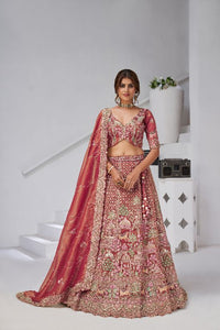 Traditional  dark Pink Bridal Lehenga Featuring Auspicious Cow and Temple Motifs
