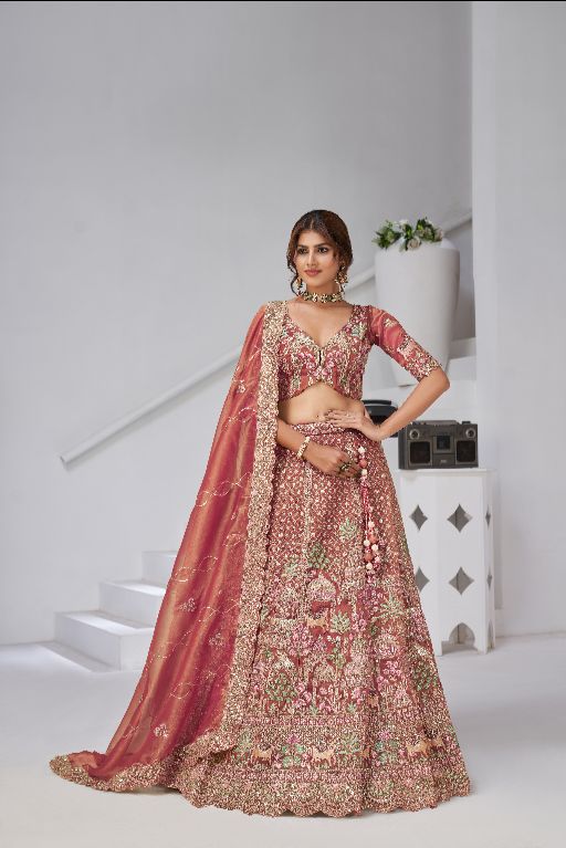 Traditional  dark Pink Bridal Lehenga Featuring Auspicious Cow and Temple Motifs