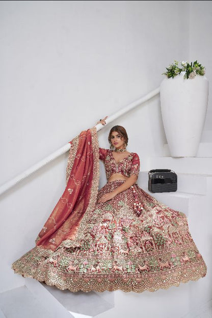 Traditional  dark Pink Bridal Lehenga Featuring Auspicious Cow and Temple Motifs