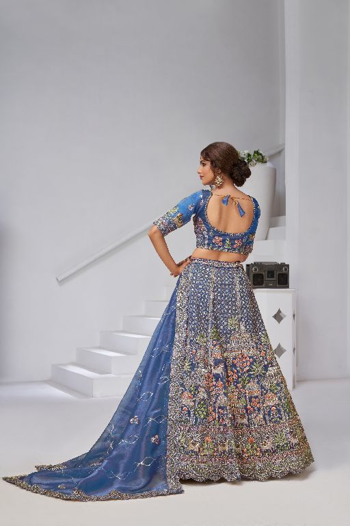 Divine Elegance in Purple – Bridal Lehenga with Temple & Cow Motifs