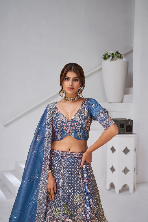 Divine Elegance in Purple – Bridal Lehenga with Temple & Cow Motifs