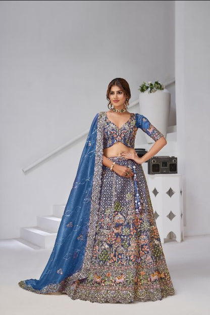 Teal Blue Raw Silk Bridal Lehenga Featuring Temple, Cow & Floral Embroidery