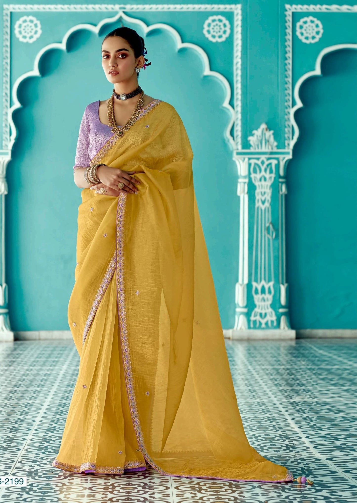 Yellow embroidery work saree with jacquard work blouse piece