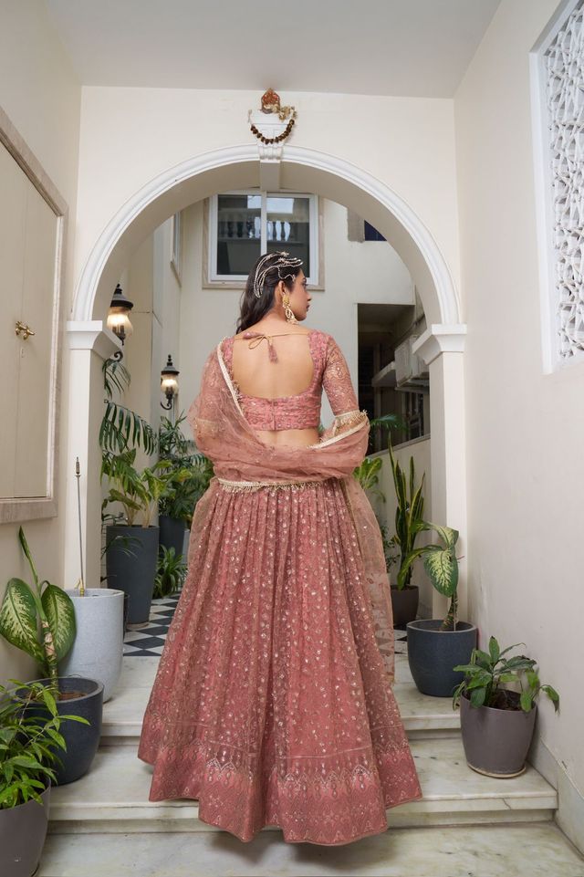 Rust Heavy Embroidery Net Semi Stitch A Line Lehenga With Blouse