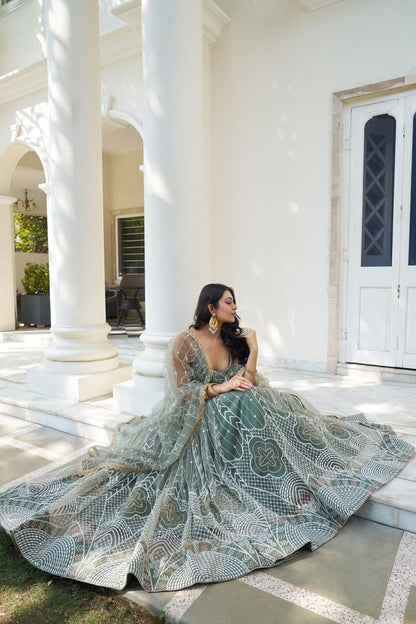 Green Heavy Embroidery Net Semi Stitch A Line Lehenga With Blouse