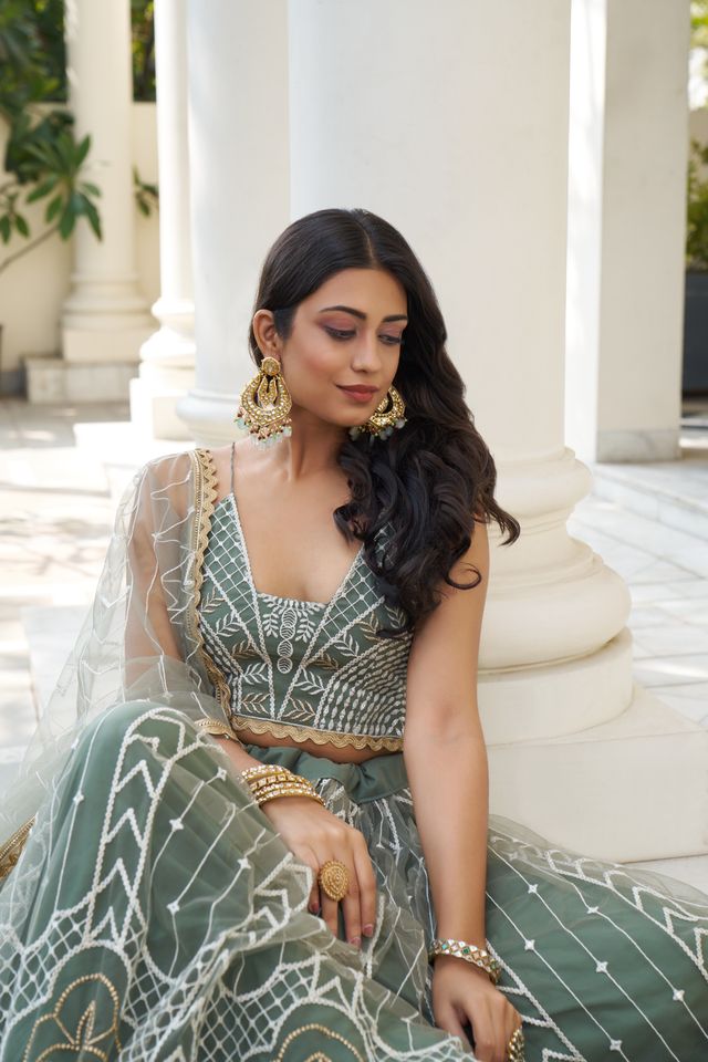 Green Heavy Embroidery Net Semi Stitch A Line Lehenga With Blouse