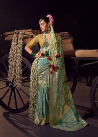 Sea Green viscose tissue hanworked pallu saree with embroidered blouse piece