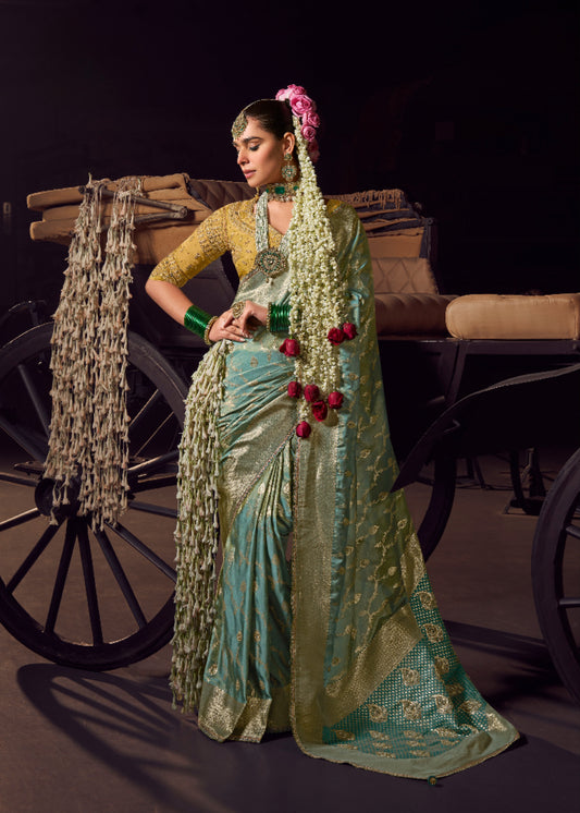 Sea Green viscose tissue hanworked pallu saree with embroidered blouse piece
