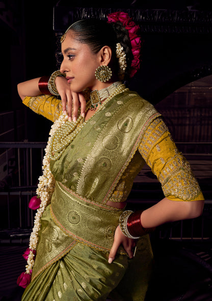 Dark Green viscose tissue hanworked pallu saree with embroidered blouse piece