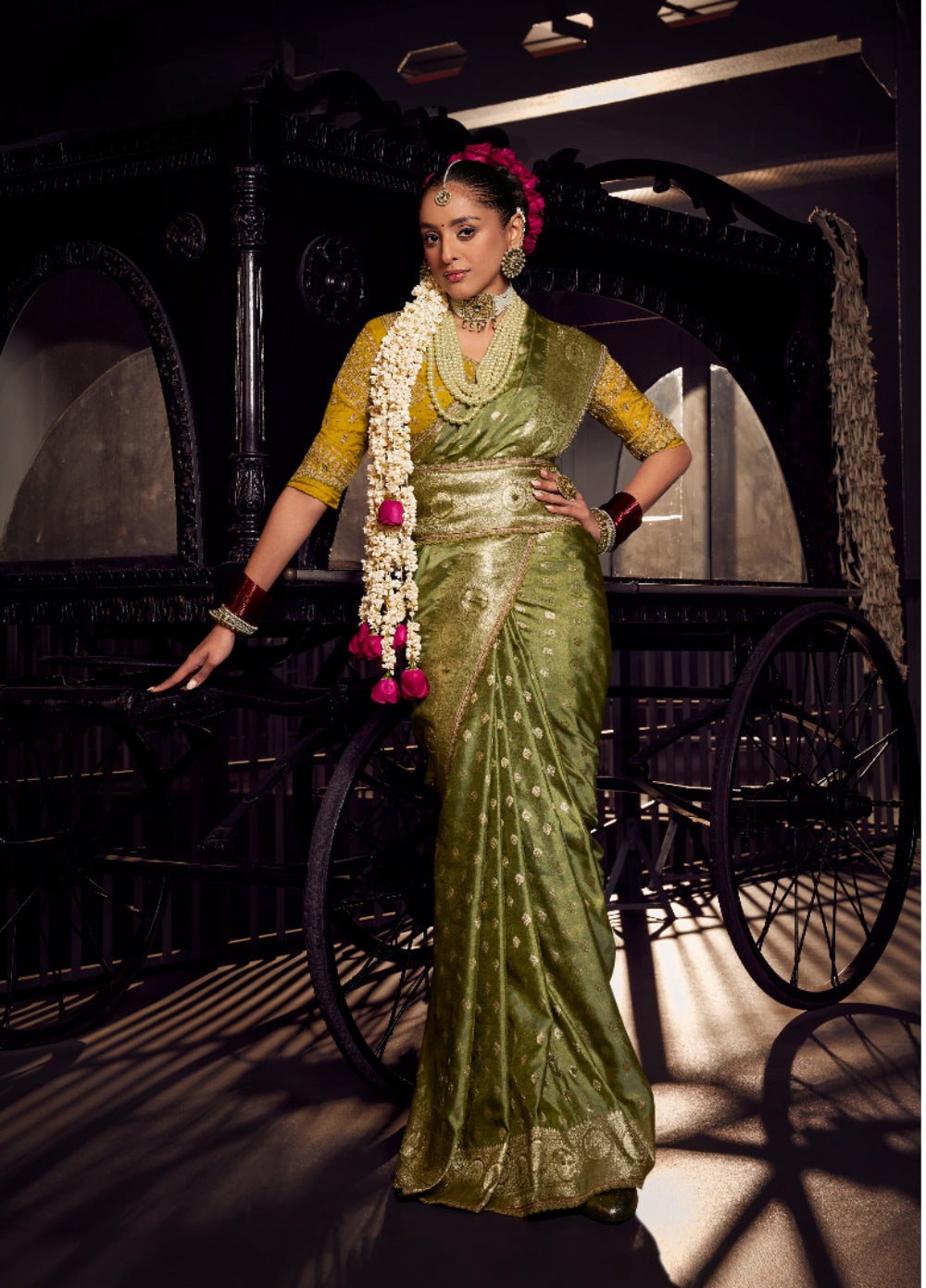 Dark Green viscose tissue hanworked pallu saree with embroidered blouse piece