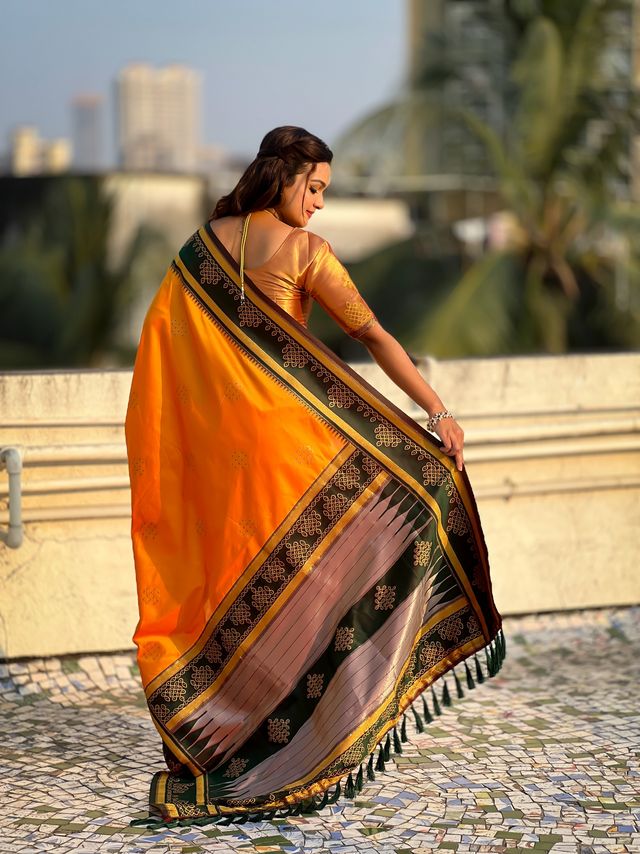 Orange Color Soft Silk Woven Designer Saree For Ceremonial Looks