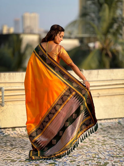 Orange Color Soft Silk Woven Designer Saree For Ceremonial Looks