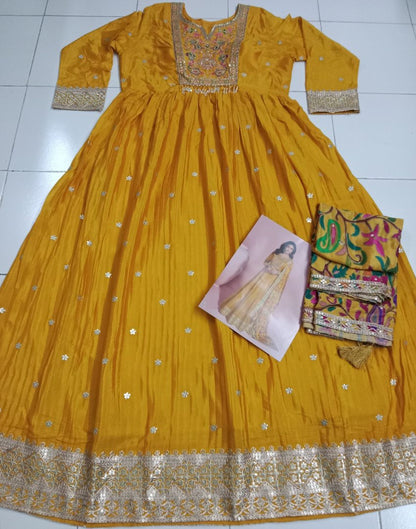 Yellow embroderied silk anarkali suit - full stitched free size