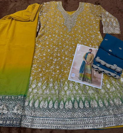 Yellow pure geogette full stitched suit Free Size upto 42