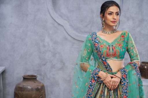The bagh collection:Graceful Green Lenega embedded by Thread and Sequin Embellished Lehengas