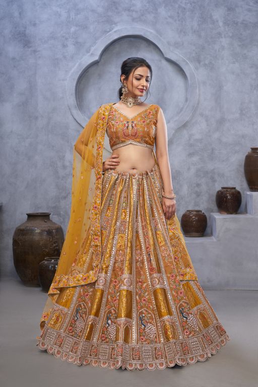 The bagh collection: Marvelous Mustard with peacock Embroidered bridal lehenga
