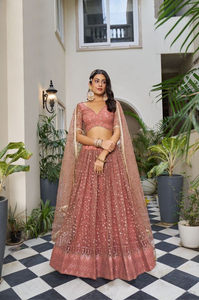 Rust Heavy Embroidery Net Semi Stitch A Line Lehenga With Blouse