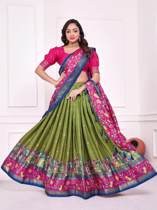 Green patola print dola silk semi stitched lehenga choli with tassels