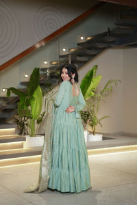 Anarkali Kurta Gown is a stunning traditional Indian outfit that combines elegance and style It is typically worn by women for special occasions