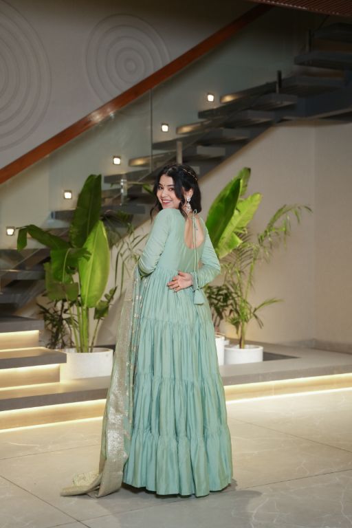 Anarkali Kurta Gown is a stunning traditional Indian outfit that combines elegance and style It is typically worn by women for special occasions