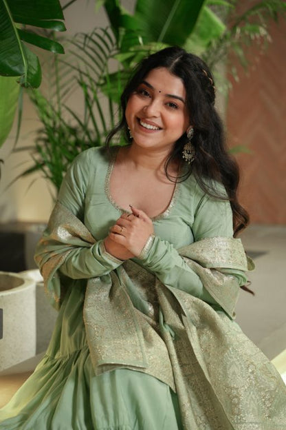 Anarkali Kurta Gown is a stunning traditional Indian outfit that combines elegance and style It is typically worn by women for special occasions