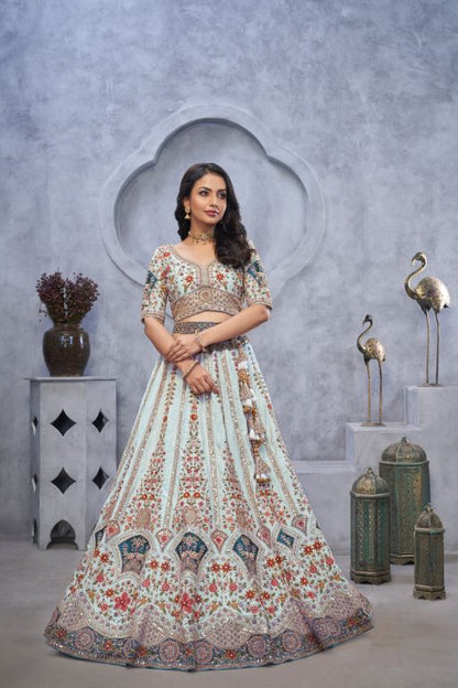 Stunning sky blue Lehenga with Zari Paisley Embroidery, Silk Patches, and Regal Peacock Motifs
