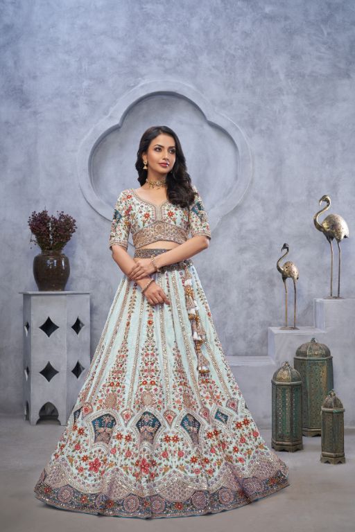 Stunning sky blue Lehenga with Zari Paisley Embroidery, Silk Patches, and Regal Peacock Motifs
