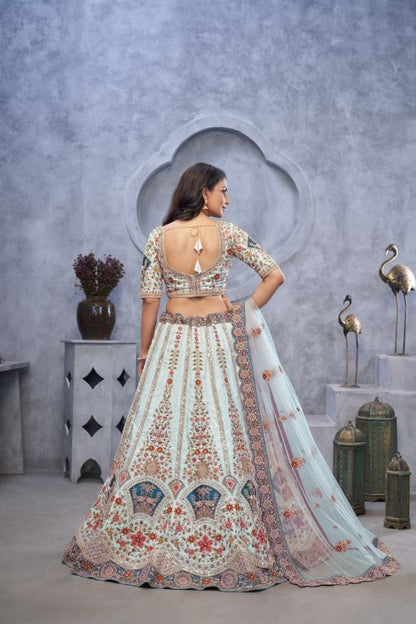 Stunning sky blue Lehenga with Zari Paisley Embroidery, Silk Patches, and Regal Peacock Motifs