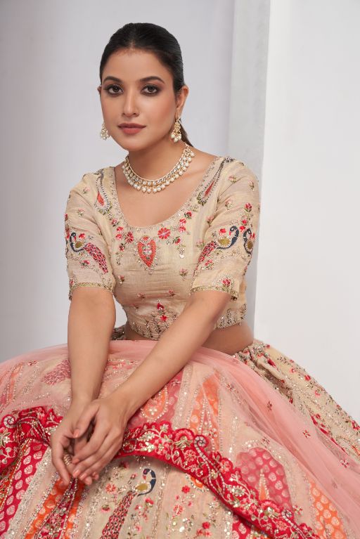 Paisely motifs beautiful peacock embroidered in Brigh Cream colours bridal lehenga choli set