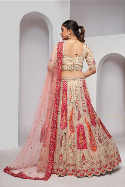 Elegenat Peacock and Paisely motifs rose Pink Silk color traditional lehenga choli
