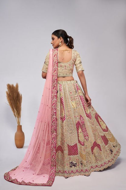 Ivory Orgenza Silk intricate paisley Motifs traditional embroidered wedding Lehenga.