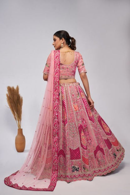 Pretty Pink Silk intricate paisley Motifs traditional embroidered wedding Lehenga.